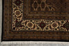 Load image into Gallery viewer, Close-up of a patterned rug with intricate designs on a neutral background