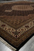 Load image into Gallery viewer, Close-up of a patterned rug with intricate designs on a plain background