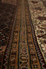 Load image into Gallery viewer, Close-up of a patterned rug with intricate designs.