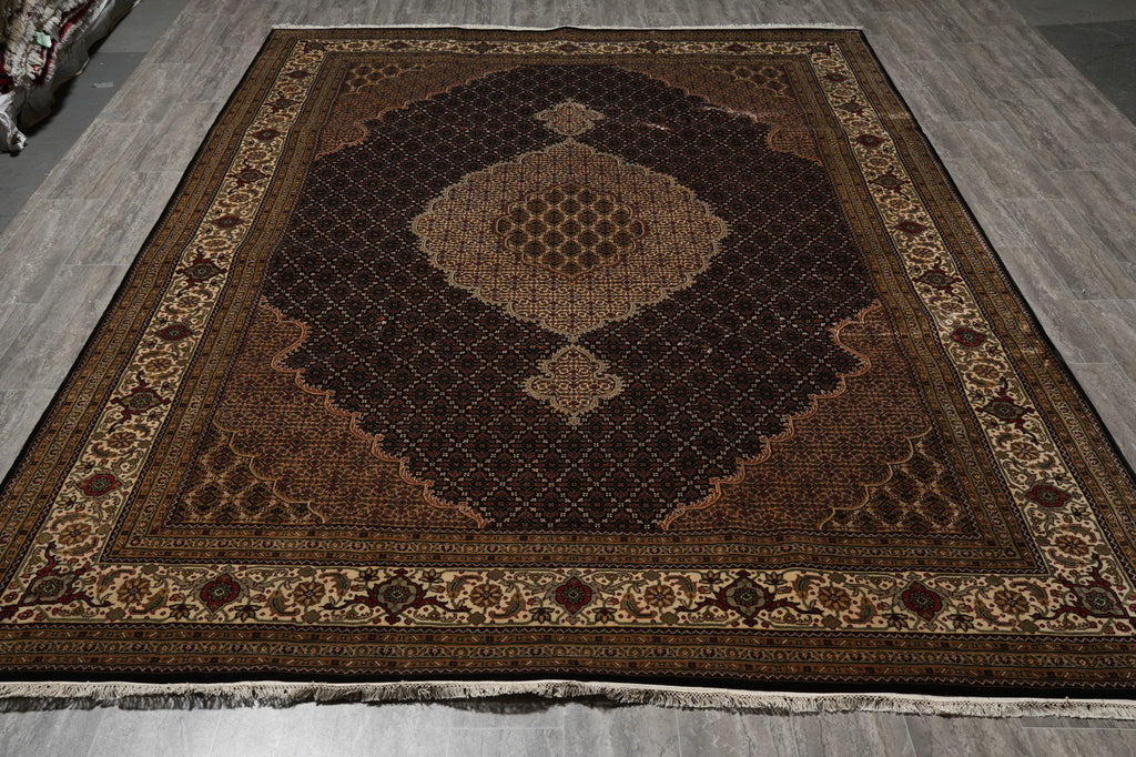 Decorative rug with intricate patterns on a wooden floor
