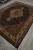 Load image into Gallery viewer, Decorative brown rug with intricate patterns on a gray floor.