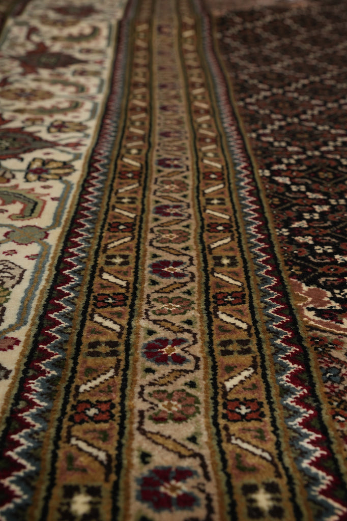 Close-up of a patterned rug with intricate designs.