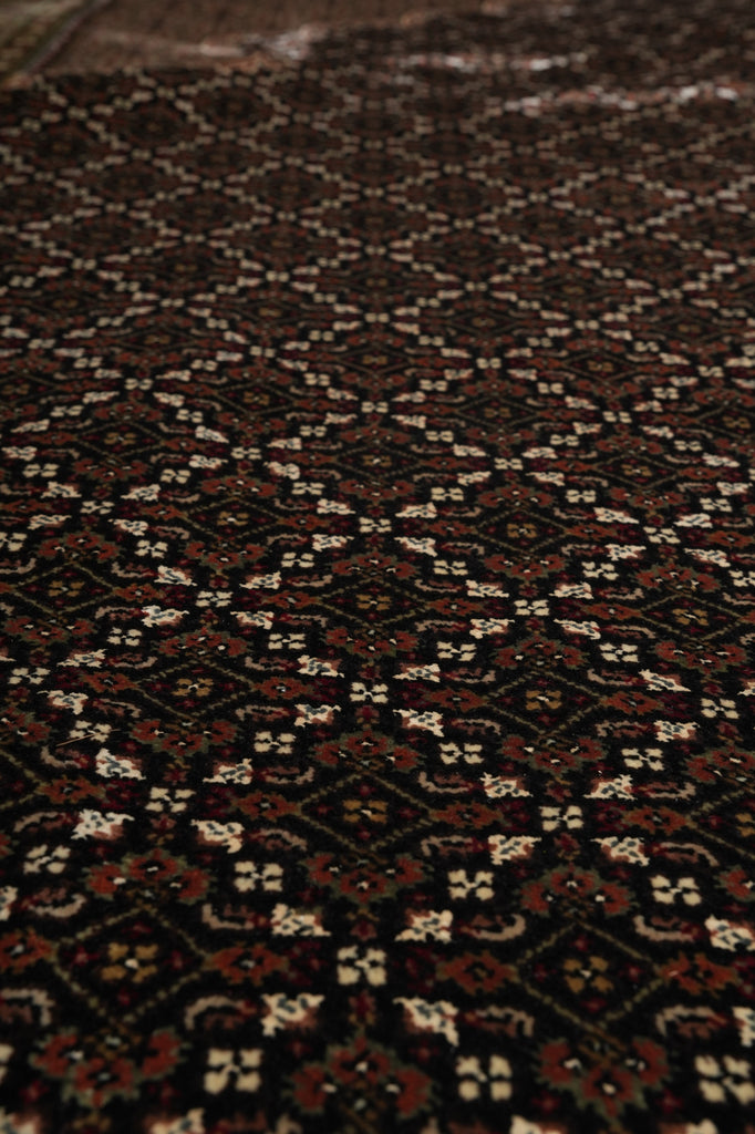 Close-up of a textured brown fabric with a subtle pattern