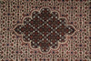 Load image into Gallery viewer, Close-up of a patterned rug with intricate designs.
