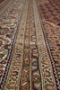 Load image into Gallery viewer, Close-up of a patterned rug with intricate designs.