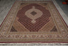Load image into Gallery viewer, Decorative rug with intricate patterns on a plain floor