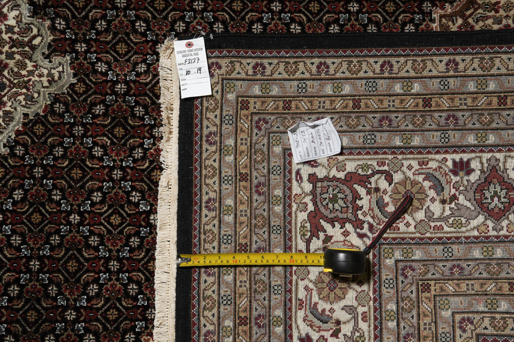 Patterned rug with a measuring tape and small container on top