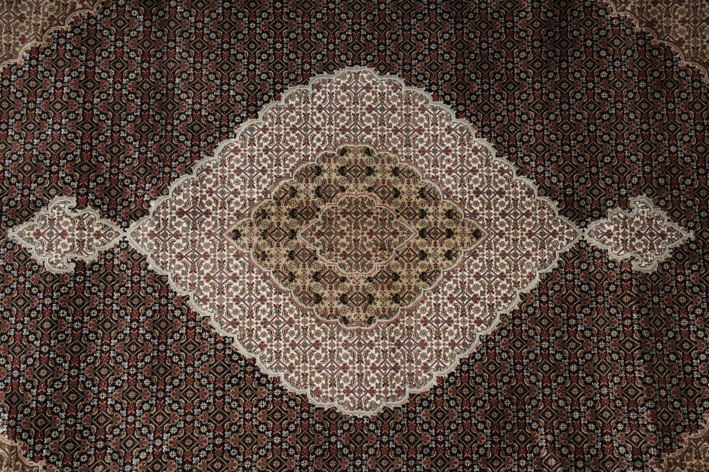 Close-up of a patterned rug with intricate designs