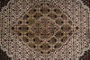Load image into Gallery viewer, Close-up of a patterned rug with intricate designs.