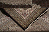 Load image into Gallery viewer, Close-up of a patterned rug with intricate designs.