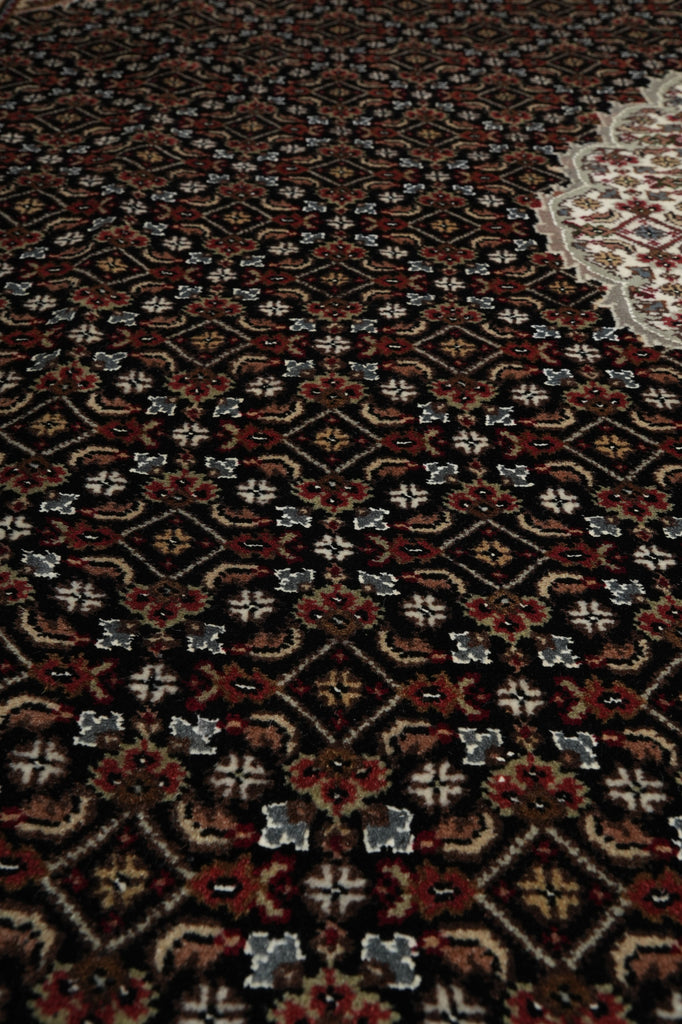 Close-up of a patterned fabric with intricate designs.