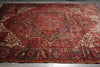 Load image into Gallery viewer, Vintage rug with intricate patterns on a plain background