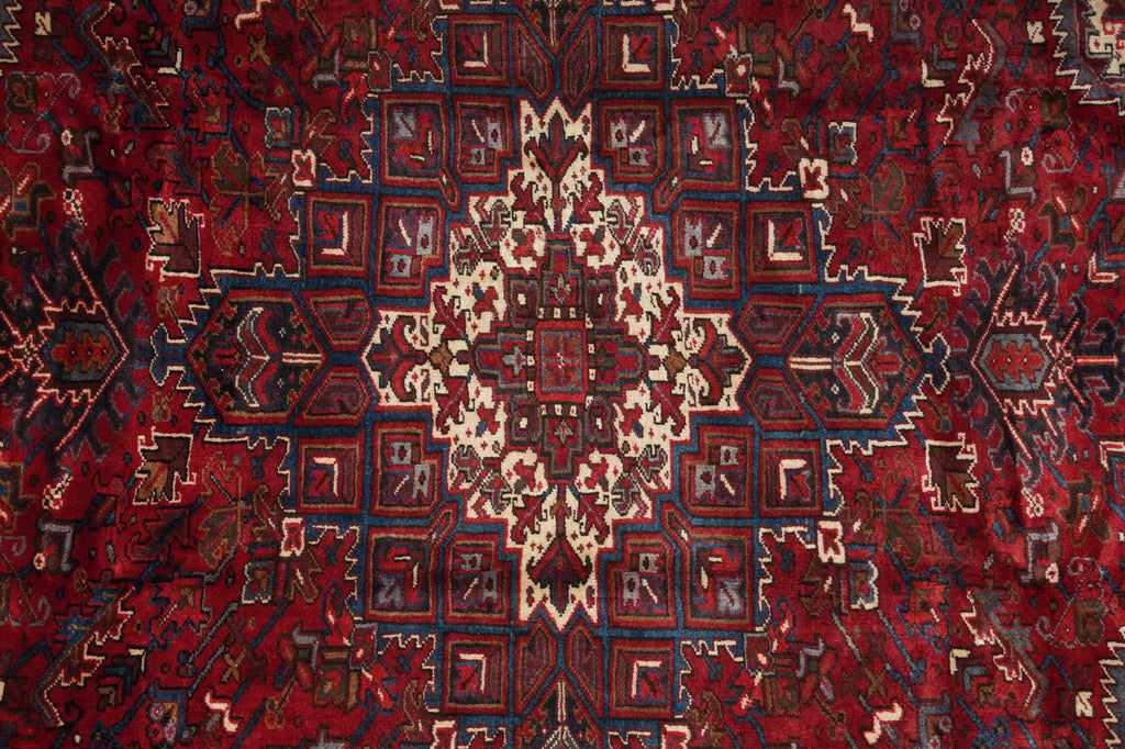 Close-up of a red and brown patterned rug