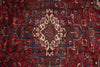 Load image into Gallery viewer, Close-up of a red and brown patterned rug