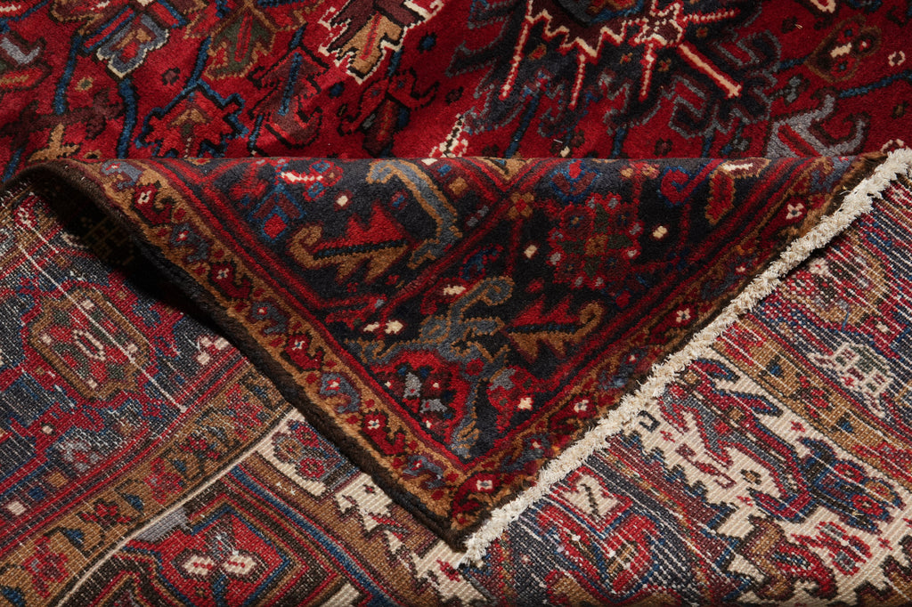 Close-up of a patterned rug with intricate designs.