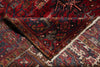 Load image into Gallery viewer, Close-up of a patterned rug with intricate designs.