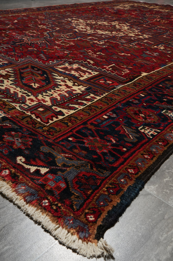 Decorative rug with intricate patterns on a plain background