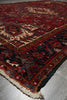 Load image into Gallery viewer, Decorative rug with intricate patterns on a plain background