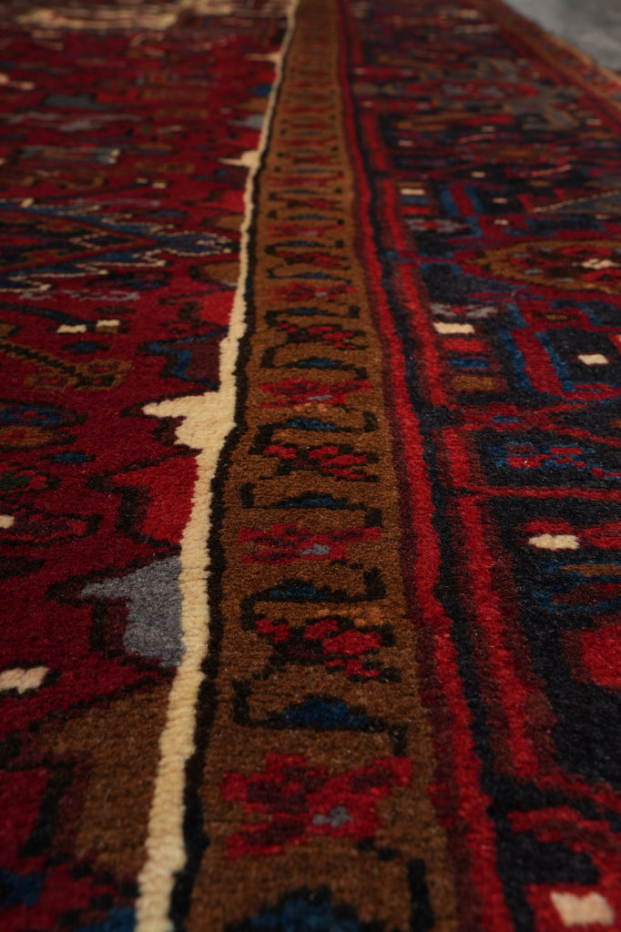 Close-up of a patterned rug with intricate designs.