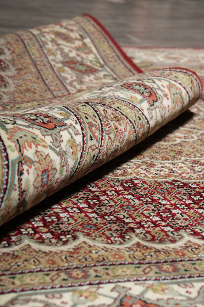 Close-up of a patterned fabric with intricate designs.