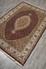 Load image into Gallery viewer, Decorative rug with intricate patterns on a wooden floor