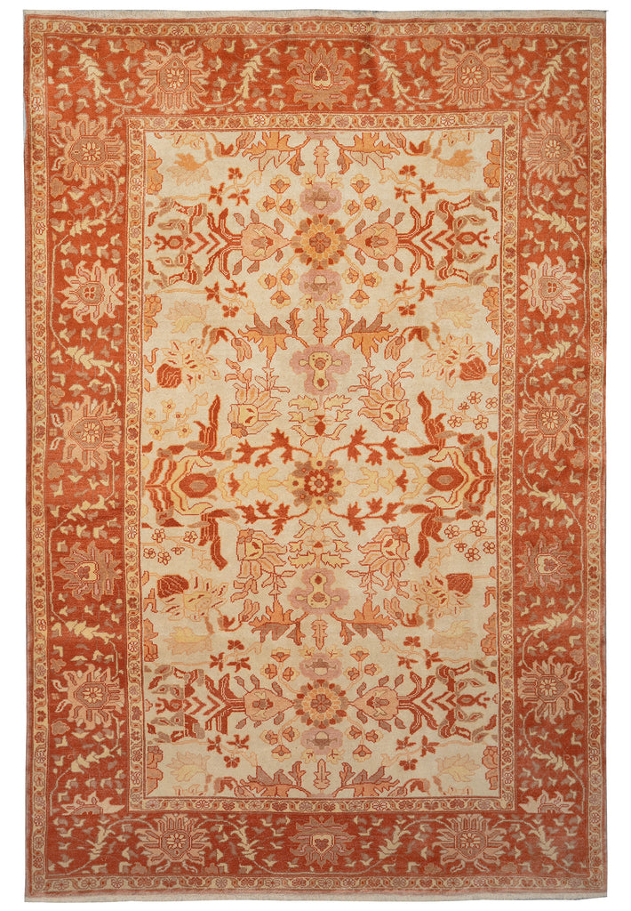 Decorative rug with intricate patterns in red and beige colors
