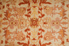 Load image into Gallery viewer, Close-up of a patterned rug with intricate designs in brown and beige.