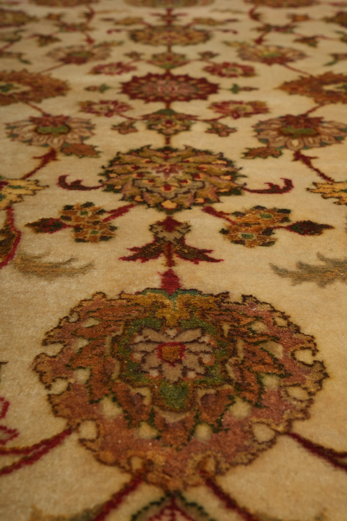 Close-up of a patterned rug with intricate designs.