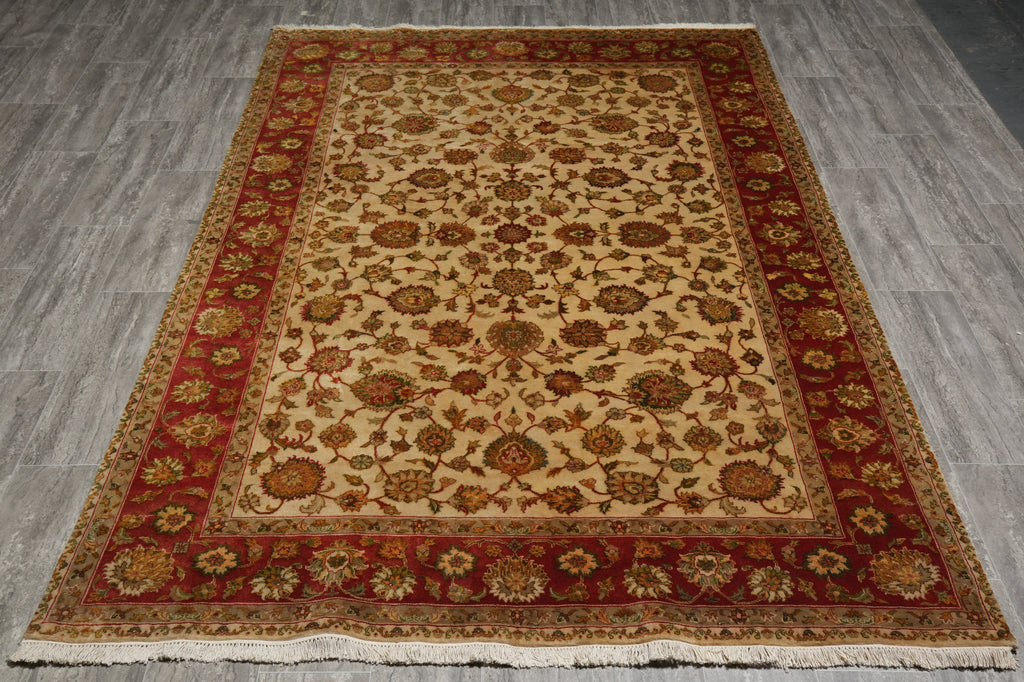 Decorative rug with intricate patterns on a wooden floor
