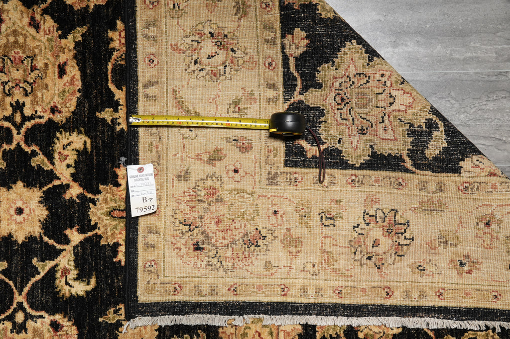 Decorative rug with a measuring tape on a gray floor