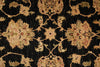 Load image into Gallery viewer, Close-up of an ornate rug with intricate patterns on a dark background