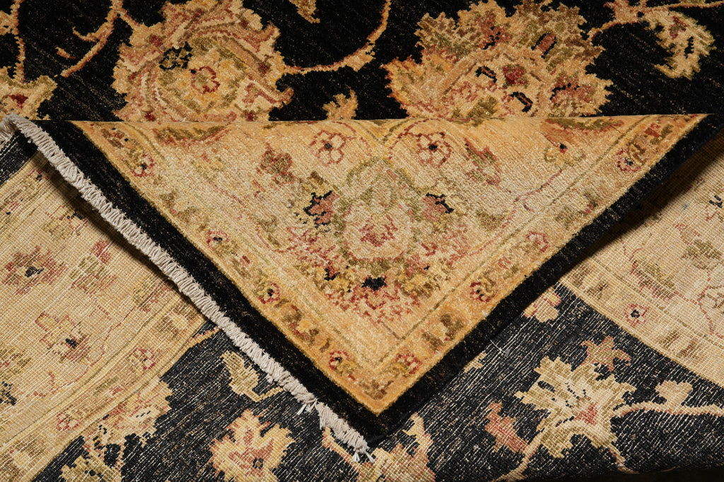 Close-up of an ornate rug with intricate patterns and colors.