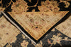 Load image into Gallery viewer, Close-up of an ornate rug with intricate patterns and colors.