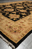 Load image into Gallery viewer, Decorative rug with intricate patterns on a neutral background