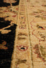Load image into Gallery viewer, Close-up of a patterned rug with intricate designs.