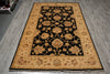 Load image into Gallery viewer, Decorative rug with intricate patterns on a wooden floor