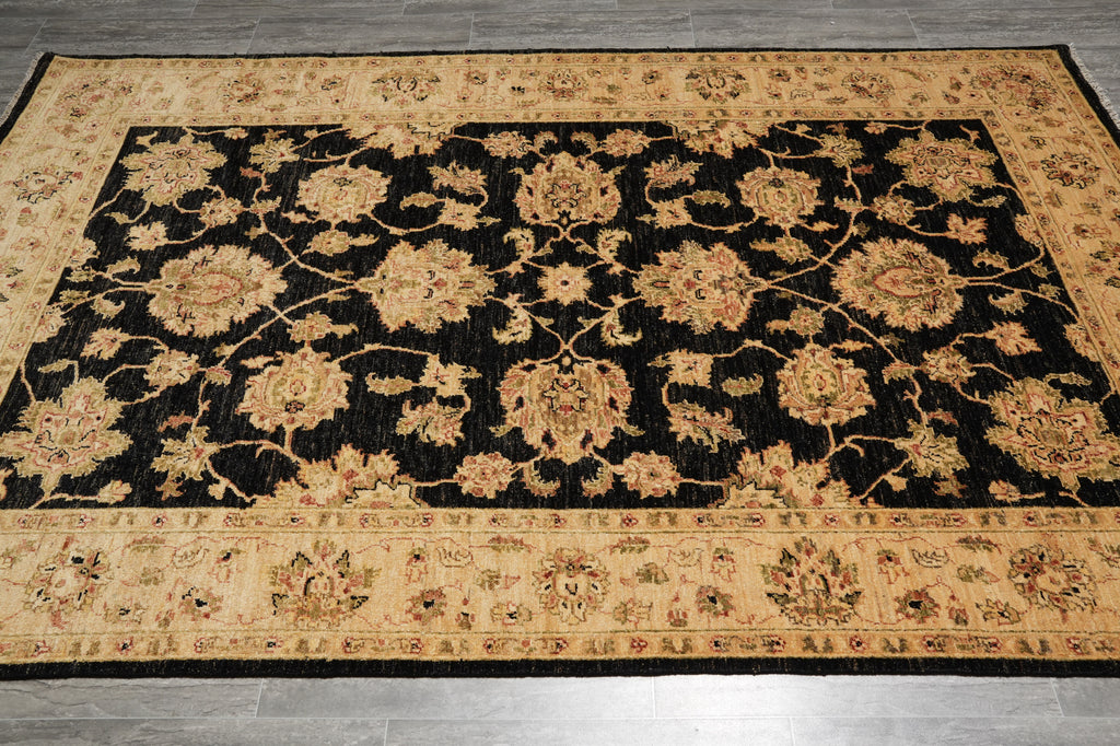 Decorative rug with floral pattern on a wooden floor