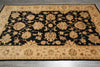 Load image into Gallery viewer, Decorative rug with floral pattern on a wooden floor