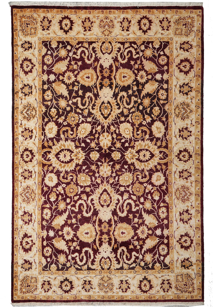 Decorative rug with intricate patterns on a plain background