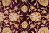 Load image into Gallery viewer, Close-up of a patterned rug with floral design on a dark background