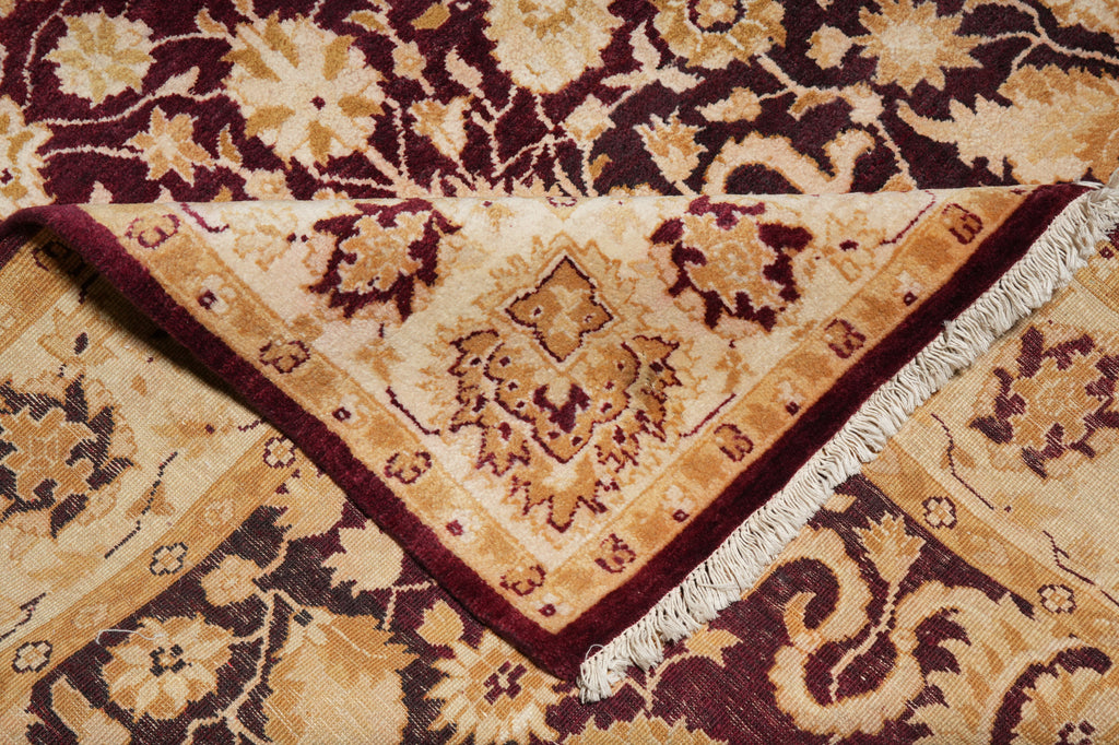 Close-up of a patterned rug with intricate designs.