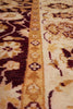 Load image into Gallery viewer, Close-up of a patterned rug with brown and beige colors