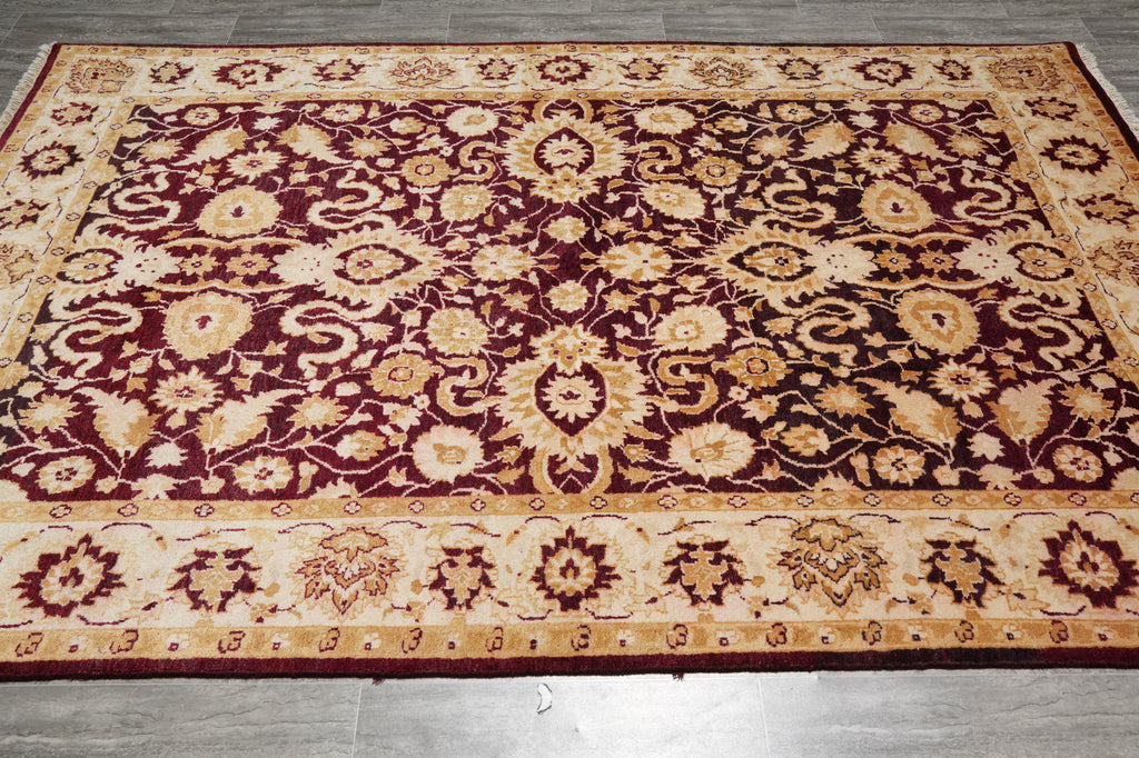 Decorative rug with floral pattern on a wooden floor