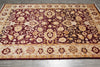 Load image into Gallery viewer, Decorative rug with floral pattern on a wooden floor