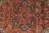 Load image into Gallery viewer, Close-up of an intricately designed rug with red, blue, and beige colors.
