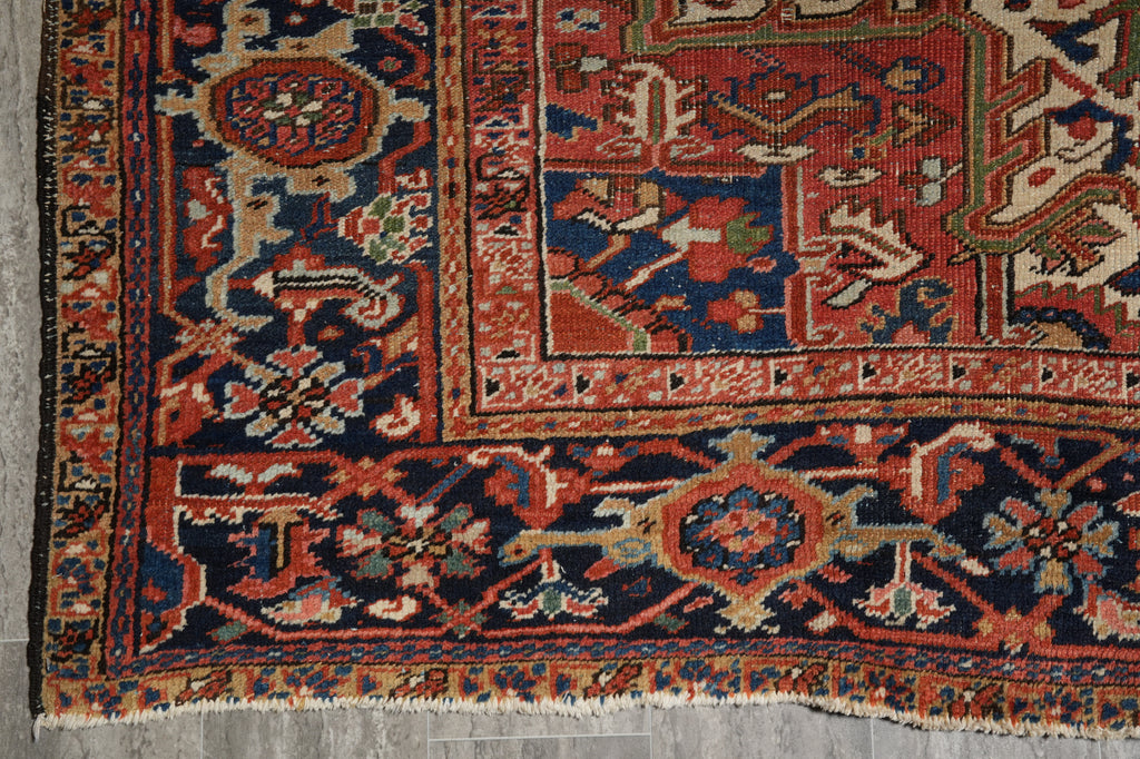 Close-up of an intricately designed rug with geometric patterns.