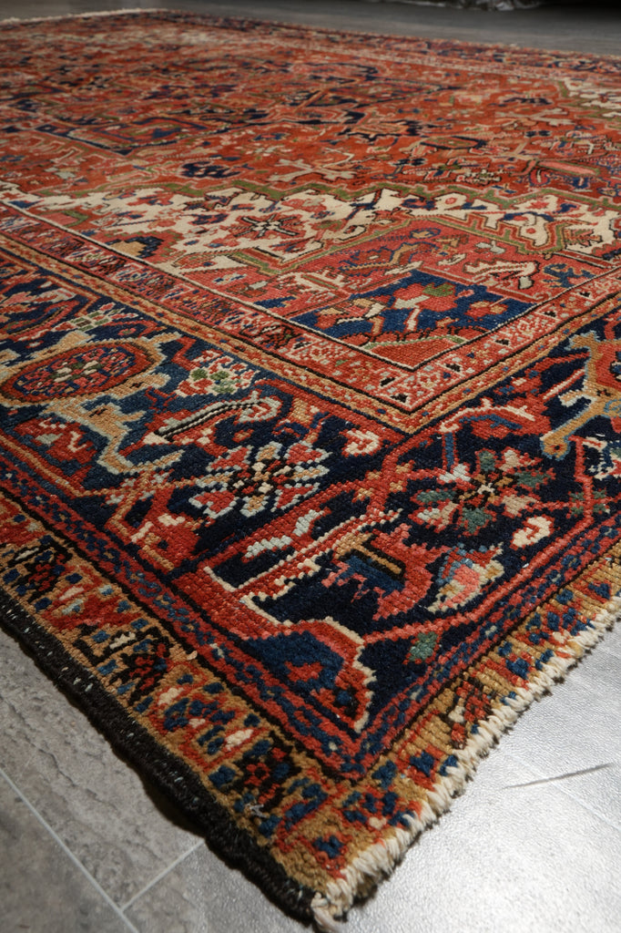 Close-up of an intricately designed rug with a focus on patterns and colors.