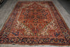 Load image into Gallery viewer, Vintage patterned rug with intricate designs on a wooden floor.