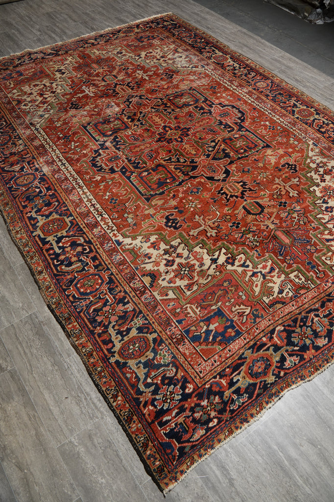 Vintage patterned rug on a wooden floor
