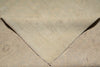 Load image into Gallery viewer, Close-up of a textured beige fabric with a visible seam.